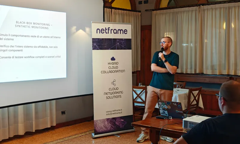 A speaker presenting at a Modena Fullstack meetup, with attendees in the room